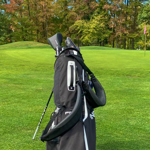 ping hoofer stand golf bag on a golf course