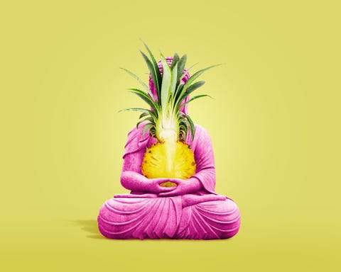 pink buddha statue with pineapple