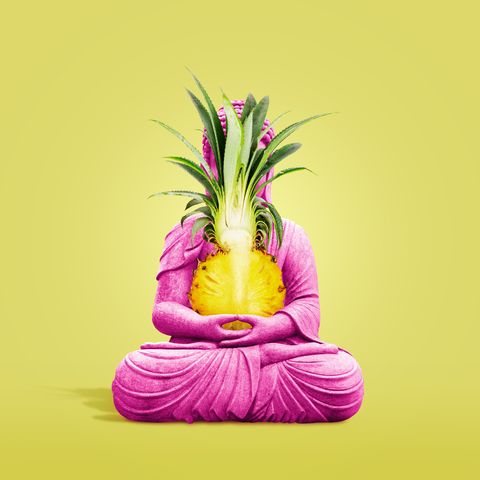 pink buddha statue with pineapple