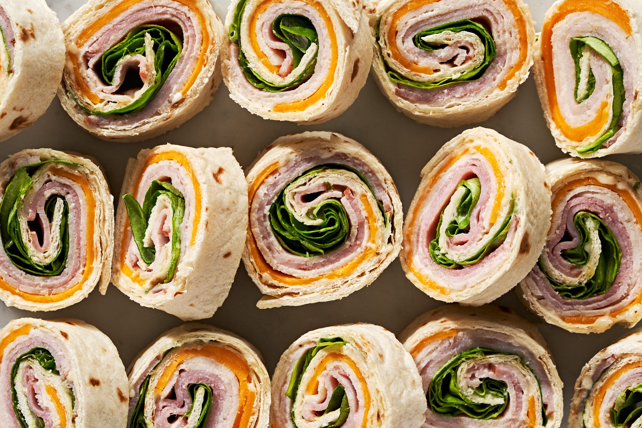 The Color Of Your Cheese Is The Secret To The Perfect Pinwheel Sandwich—We Don't Make The Rules