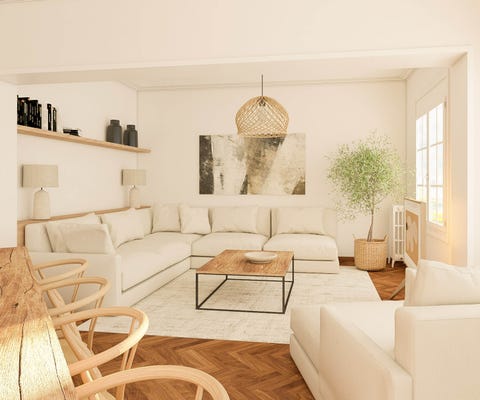 salón comedor en tonos neutros como sofá rinconera y mesa de centro de madera