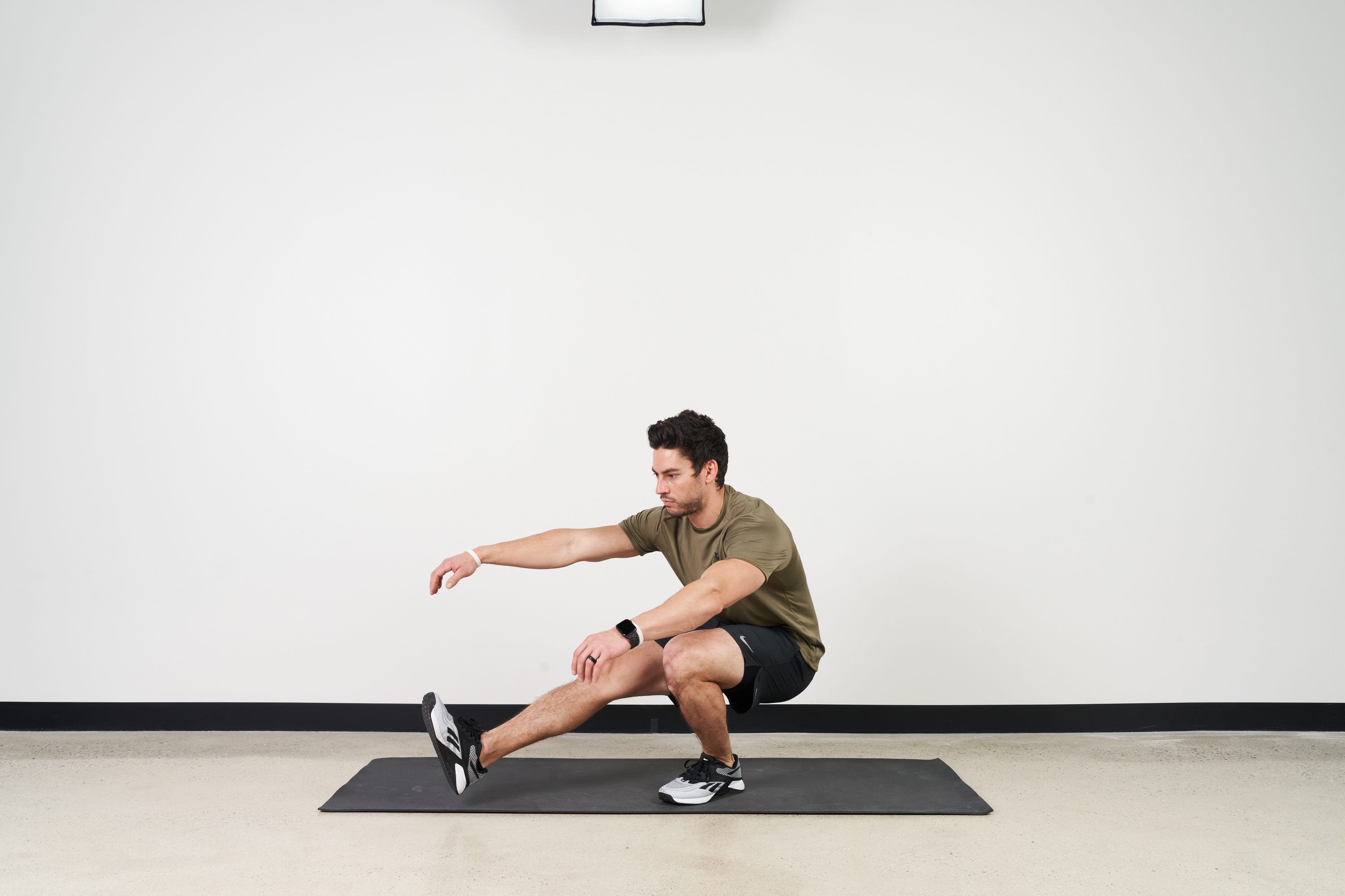Learn to Master the Pistol Squat With This How-To Guide, Including Modifications