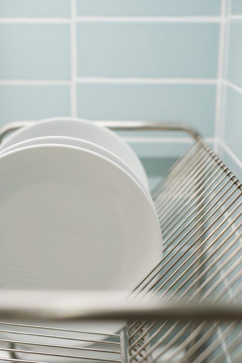 White plates on drainrack white plates is on the drain rack