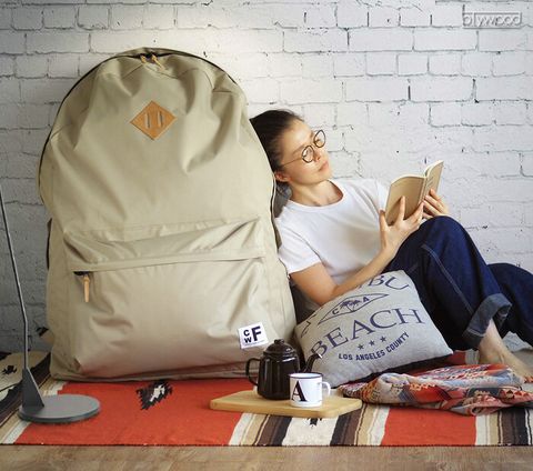 Backpack, Comfort, Sitting, Furniture, Bag, Luggage and bags, Child, Baggage, Bean bag chair, Shoe, 