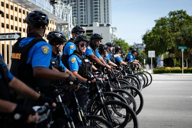 a row of police cyclists is seen during a rally in response to the recent death of george floyd in fort lauderdale, florida on may 31, 2020   thousands of national guard troops patrolled major us cities  after five consecutive nights of protests over racism and police brutality that boiled over into arson and looting, sending shock waves through the country the death monday of an unarmed black man, george floyd, at the hands of police in minneapolis ignited this latest wave of outrage in the us over law enforcement's repeated use of lethal force against african americans    this one like others before captured on cellphone video photo by eva marie uzcategui  afp photo by eva marie uzcateguiafp via getty images