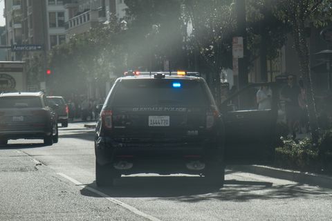 police pulling over vehicle on the streets of california