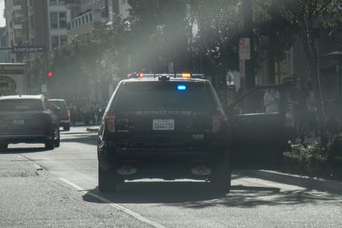 police pulling over vehicle on the streets of california