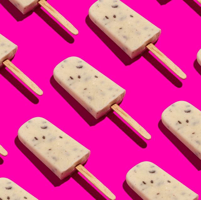 homemade popsicles on pink background