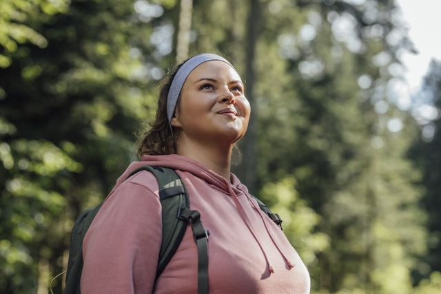 portrait of a beautiful woman hiker smiling