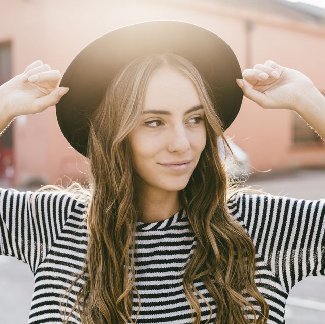 Image result for girl smiling wearing a hat