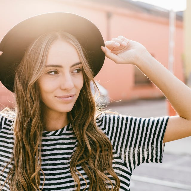 Image result for girl smiling wearing a hat