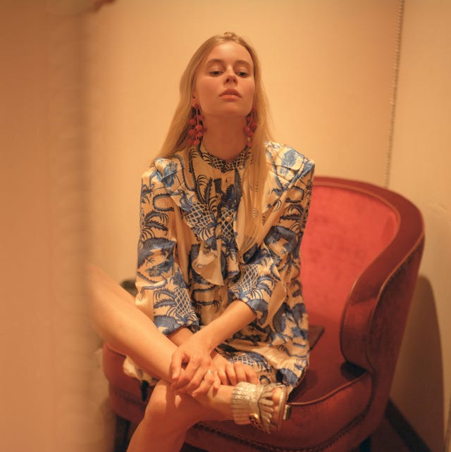 Portrait of young beautiful woman inside dressing room with mirror Portrait of young beautiful woman inside dressing room with mirror