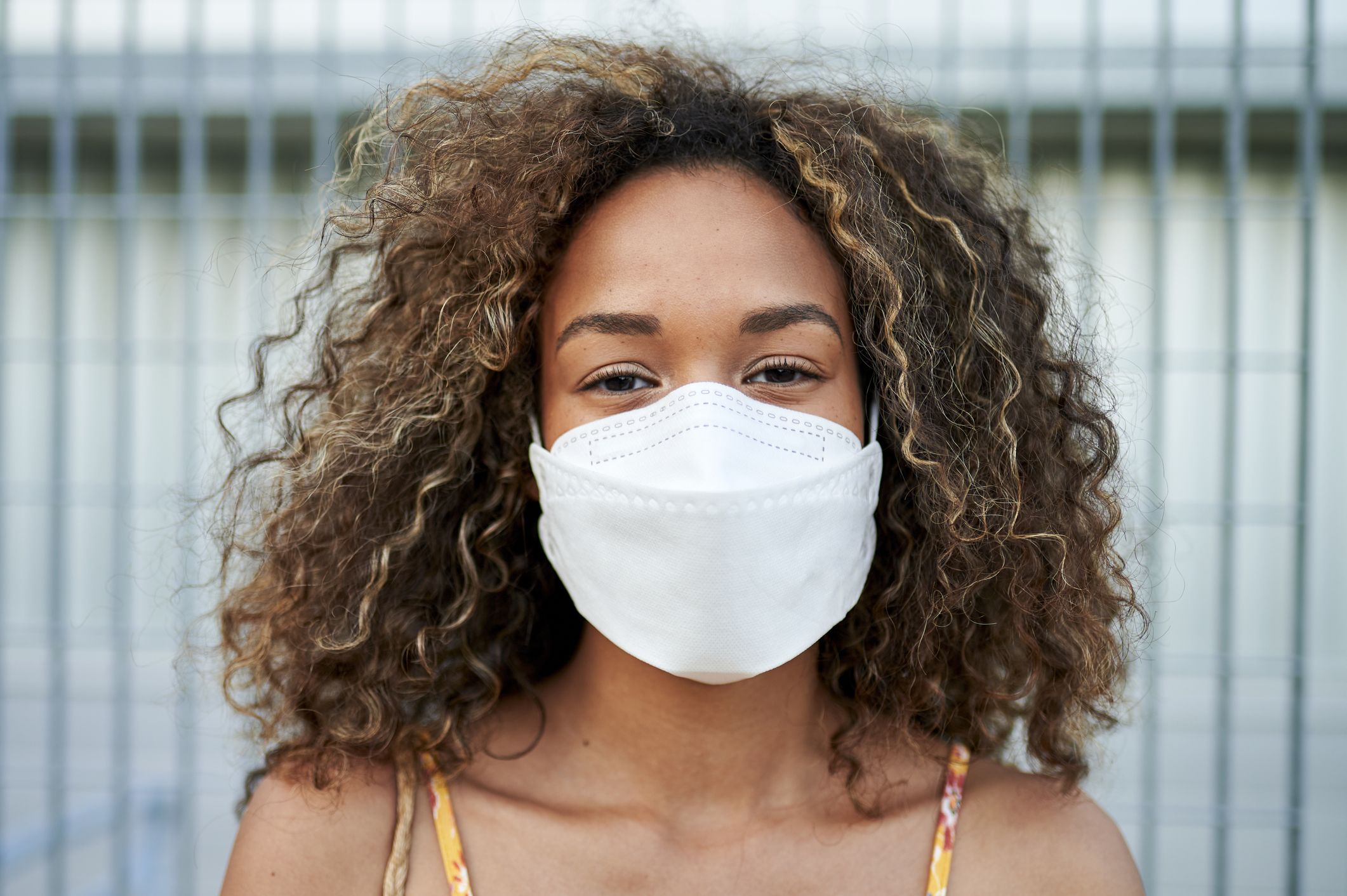portrait of young woman with antiviral mask royalty free image 1599139043