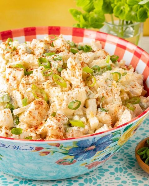 southern potato salad with green onion in floral bowl