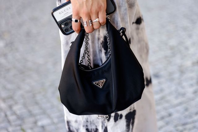 berlin, germany   september 09 a black bag by prada as a detail of influencer jacqueline zelwis, seen at the anja gockel fashion brunch during the mercedes benz fashion week on september 9, 2021 in berlin, germany photo by streetstyleshootersgetty images