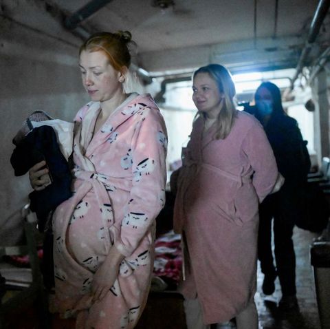 pregnant women in bathrobes