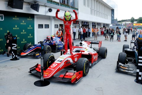 Prema Racing's German driver Mick Schumacher celebrates...