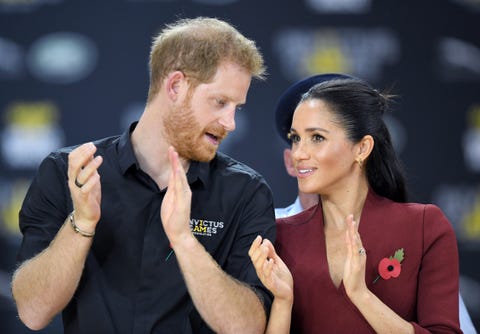 Meghan Markle Wears Scanlan Theodore Wrap Top With Prince Harry to ...