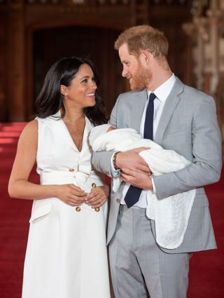 the duke  duchess of sussex pose with their newborn son