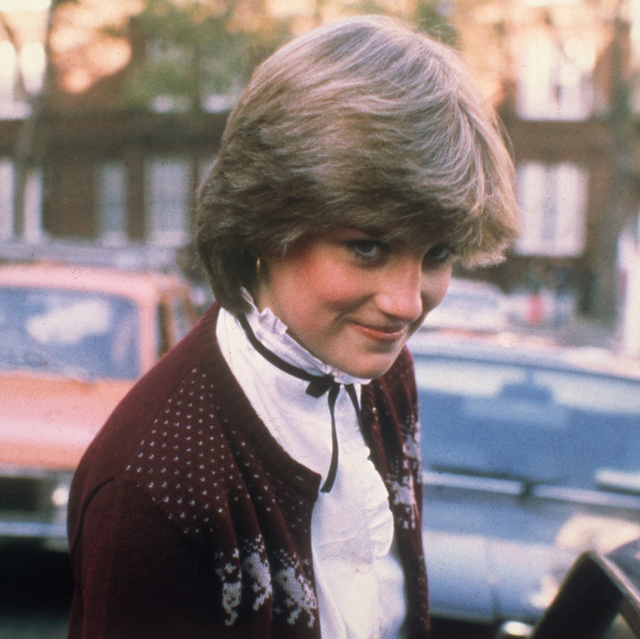 lady diana spencer wearing a maroon cardigan, white shirt and black bow before she officially became princess diana