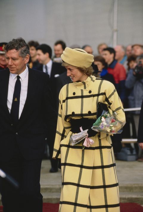 diana, princess of wales  1961   1997 on the isle of wight, to name the new hm customs patrol boat vigilant, 6th december 1988 she is wearing a black and yellow coat by escada and a philip somerville hat  photo by terry fincherprincess diana archivegetty images