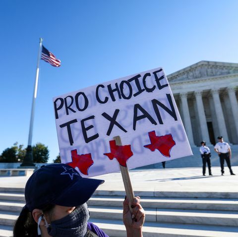 someone holding a sign that reads pro choice texan outside the supreme court