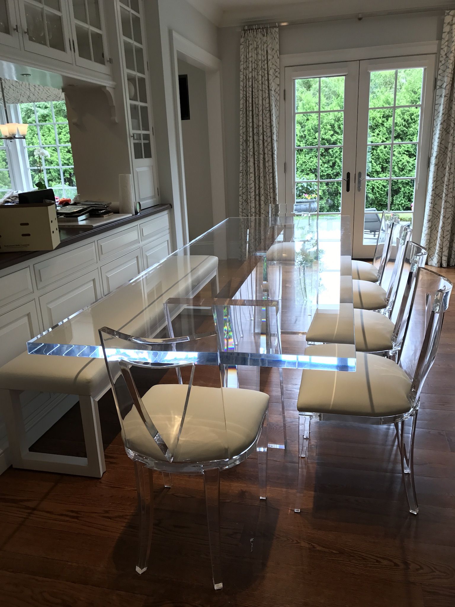 dining room with clear chairs