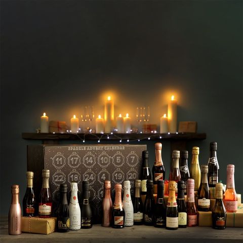 Bottle, Glass bottle, Wine bottle, Lighting, Candle, Alcohol, Liqueur, Night, Still life photography, Scotch whisky, 