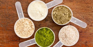 Five different scoops of protein powders