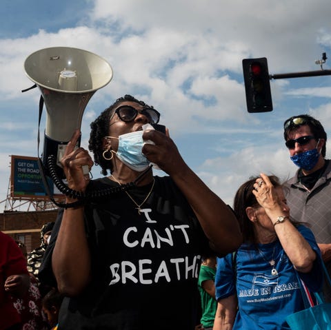 'i can't breathe' protest held after man dies in police custody in minneapolis