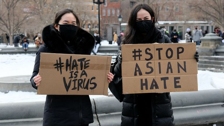 protestors-hold-signs-that-read-hate-is-a-virus-and-stop-news-photo-1615535282.?crop=1.00xw:0.847xh;0,0.0805xh&resize=768:*