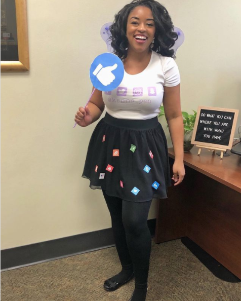 social butterfly halloween pun costume with butterfly wings and social media icons