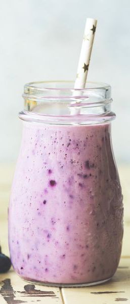 purple blueberry blackberry and banana smoothie in a jar