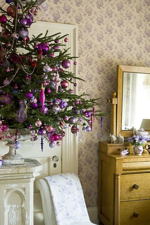 purple christmas decorations in traditional room