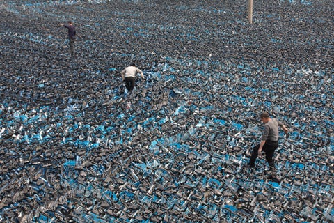 Shared Bikes Piled Up In Zhengzhou zhengzhou, china april 08 employees of shanghai based bike sharing company hello global look for usable shared bikes piled up at a recycling depot on april 8, 2021 in zhengzhou, henan province of china photo by he zhiquanvcg via getty images