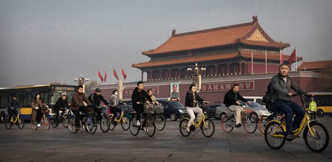 beijing, china   march 29 chinese commuters ride bike share through tiananmen square on march 29, 2017 in beijing, china the popularity of bike shares has exploded in the past year with more than two dozen providers now battling for market share in major cities across china  the bikes are hailed as an efficient, cheap, and environmentally friendly solution for commuters, where riders unlock the stationless bicycles using a mobile phone app, drop them anywhere for the next user, and spend as little as 1 yuan $015 per hour  given the bikes have several users a day   some of them inexperienced riders who swerve into traffic   they are often damaged, vandalized, or abandoned  companies like ofo routinely collect the battered two wheelers and bring them to a makeshift depot that is part repair shop, part graveyard where they are either salvaged or scrapped  the bike shares are powering a cycling revival of sorts in a country once known as the 'kingdom of bicycles'  in the early years of communist china, most chinese aspired to own a bicycle as a marker of achievement  when the country's economic transformation made cars a more valued status symbol, the bicycle   a chinese cultural icon   was mocked as a sign of backwardness  the bike share craze is also a boon for manufacturers who are now mass producing over a million bikes a month to meet demand, and the number of shared bike users will reach 50 million in china by the end of the year, according to beijing based bigdata research  not everyone is cheering the revival though, as municipal officials are drafting new regulations to control the chaotic flood of bicycles on streets and sidewalks   photo by kevin frayergetty images