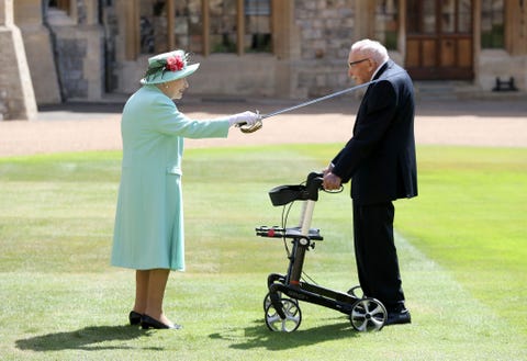 the queen confers the honour of knighthood on captain sir thomas moore