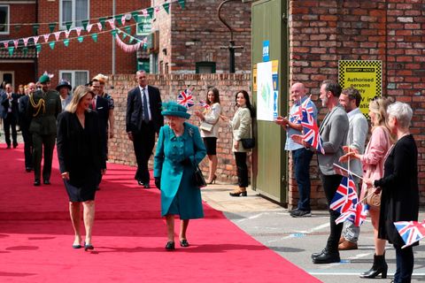 the queen visits manchester coronation street set