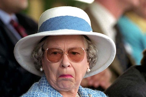 Queen Elizabeth Is Wearing Sunglasses and Carrying an Umbrella Because