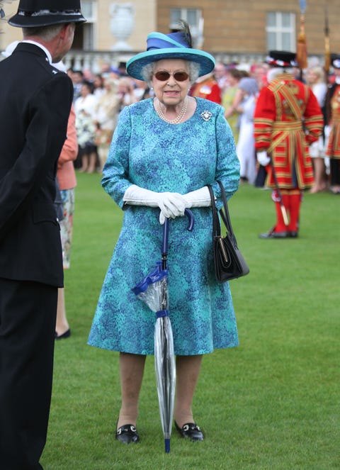 Queen Elizabeth Is Wearing Sunglasses and Carrying an Umbrella Because ...