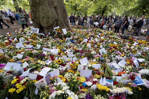 floral tributes in green park