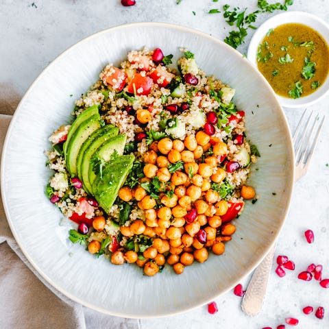 quinoa chickpea salad with tomato, cucumber, pomegranate and avocado