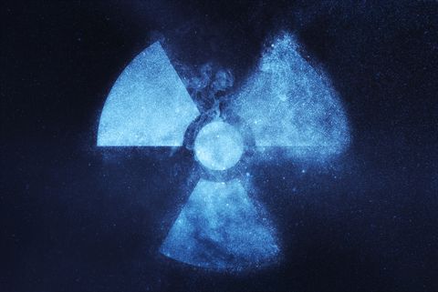 Radiation sign, Radiation symbol. Abstract night sky background