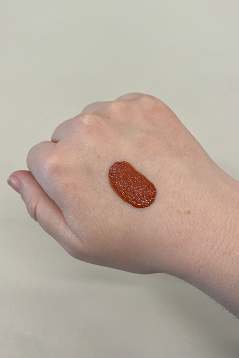 a swatch of rare beauty liquid blush on the back of my hand