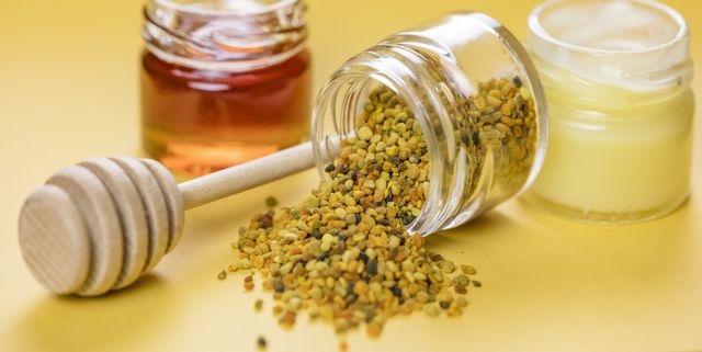 raw organic bee pollen, royal jelly and honey in jar bee pollen granules apitherapy