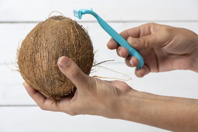 razor blade and coconut  shaving concept