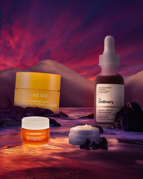 face and body products on beach background