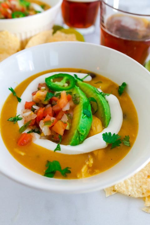 texas chicken chowder with pico de gallo and avocado garnish