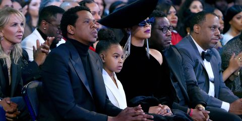 Blue Ivy Carter with her parents Beyonce and Jay Z at the60th Annual GRAMMY Awards.