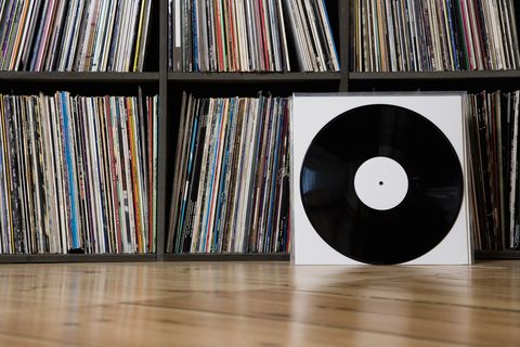 Records leaning against shelves